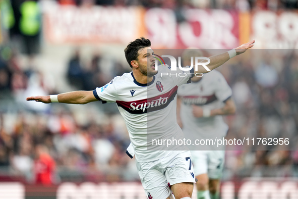 Riccardo Orsolini of Bologna FC celebrates after scoring second goal during the Serie A Enilive match between AS Roma and Bologna FC at Stad...