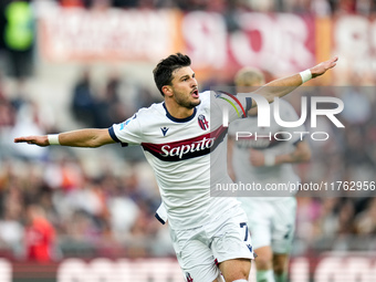 Riccardo Orsolini of Bologna FC celebrates after scoring second goal during the Serie A Enilive match between AS Roma and Bologna FC at Stad...