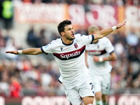 Riccardo Orsolini of Bologna FC celebrates after scoring second goal during the Serie A Enilive match between AS Roma and Bologna FC at Stad...