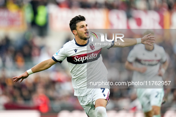 Riccardo Orsolini of Bologna FC celebrates after scoring second goal during the Serie A Enilive match between AS Roma and Bologna FC at Stad...