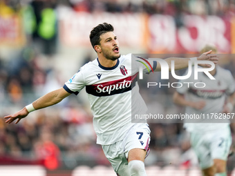 Riccardo Orsolini of Bologna FC celebrates after scoring second goal during the Serie A Enilive match between AS Roma and Bologna FC at Stad...