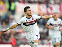 Riccardo Orsolini of Bologna FC celebrates after scoring second goal during the Serie A Enilive match between AS Roma and Bologna FC at Stad...