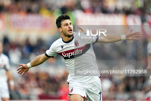 Riccardo Orsolini of Bologna FC celebrates after scoring second goal during the Serie A Enilive match between AS Roma and Bologna FC at Stad...