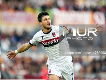 Riccardo Orsolini of Bologna FC celebrates after scoring second goal during the Serie A Enilive match between AS Roma and Bologna FC at Stad...