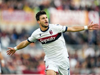 Riccardo Orsolini of Bologna FC celebrates after scoring second goal during the Serie A Enilive match between AS Roma and Bologna FC at Stad...