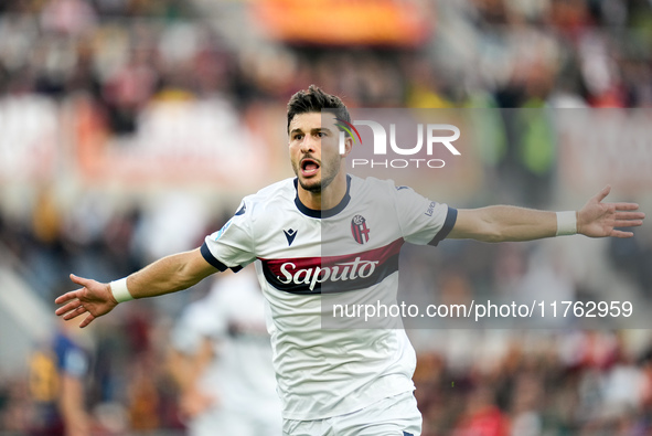 Riccardo Orsolini of Bologna FC celebrates after scoring second goal during the Serie A Enilive match between AS Roma and Bologna FC at Stad...