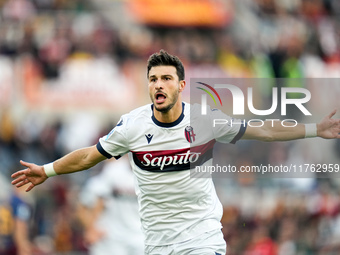 Riccardo Orsolini of Bologna FC celebrates after scoring second goal during the Serie A Enilive match between AS Roma and Bologna FC at Stad...