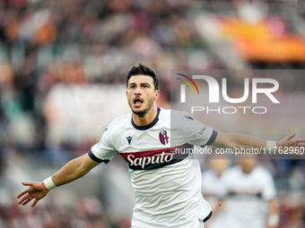 Riccardo Orsolini of Bologna FC celebrates after scoring second goal during the Serie A Enilive match between AS Roma and Bologna FC at Stad...