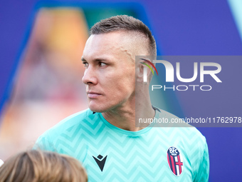 Lukasz Skorupski of Bologna FC looks on during the Serie A Enilive match between AS Roma and Bologna FC at Stadio Olimpico on November 10, 2...