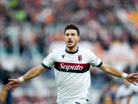 Riccardo Orsolini of Bologna FC celebrates after scoring second goal during the Serie A Enilive match between AS Roma and Bologna FC at Stad...