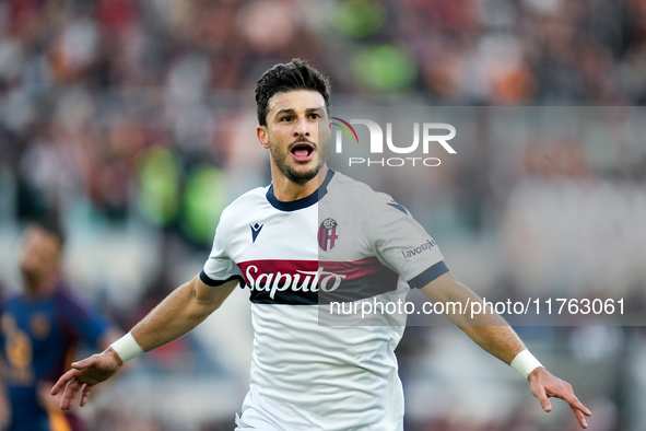 Riccardo Orsolini of Bologna FC celebrates after scoring second goal during the Serie A Enilive match between AS Roma and Bologna FC at Stad...