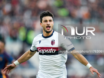 Riccardo Orsolini of Bologna FC celebrates after scoring second goal during the Serie A Enilive match between AS Roma and Bologna FC at Stad...