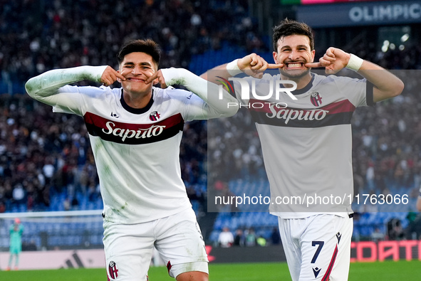 Riccardo Orsolini of Bologna FC celebrates with Santiago Castro after scoring second goal during the Serie A Enilive match between AS Roma a...