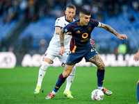 Jesper Karlsson of Bologna FC and Gianluca Mancini of AS Roma compete for the ball during the Serie A Enilive match between AS Roma and Bolo...