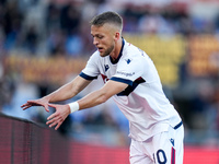 Jesper Karlsson of Bologna FC celebrates after scoring third goal during the Serie A Enilive match between AS Roma and Bologna FC at Stadio...