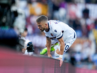 Jesper Karlsson of Bologna FC celebrates after scoring third goal during the Serie A Enilive match between AS Roma and Bologna FC at Stadio...