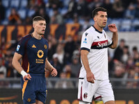 Artem Dovbyk of A.S. Roma and Nicolo Casale of Bologna F.C. participate in the 12th day of the Serie A Championship between A.S. Roma and Bo...