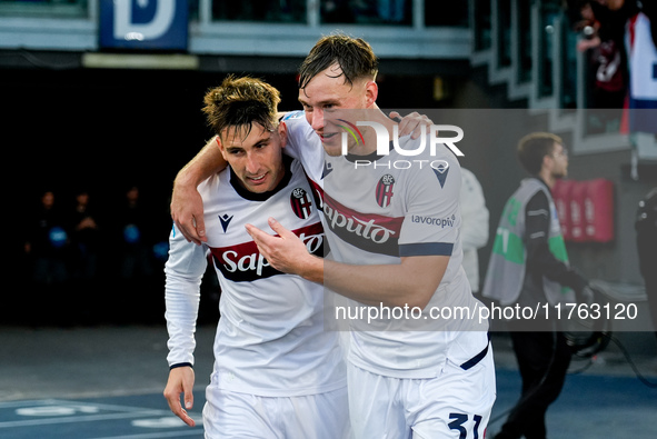 Sam Beukema of Bologna FC celebrates with Juan Miranda after Jesper Karlsson of Bologna FC scored third goal during the Serie A Enilive matc...