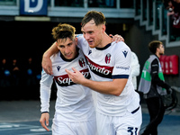 Sam Beukema of Bologna FC celebrates with Juan Miranda after Jesper Karlsson of Bologna FC scored third goal during the Serie A Enilive matc...