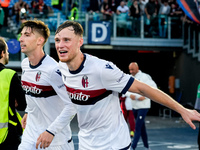 Sam Beukema of Bologna FC celebrates with Juan Miranda after Jesper Karlsson of Bologna FC scored third goal during the Serie A Enilive matc...