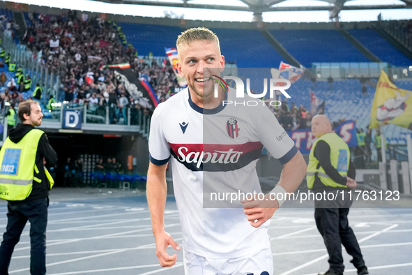 Jesper Karlsson of Bologna FC celebrates after scoring third goal during the Serie A Enilive match between AS Roma and Bologna FC at Stadio...