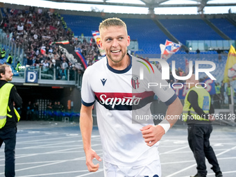 Jesper Karlsson of Bologna FC celebrates after scoring third goal during the Serie A Enilive match between AS Roma and Bologna FC at Stadio...