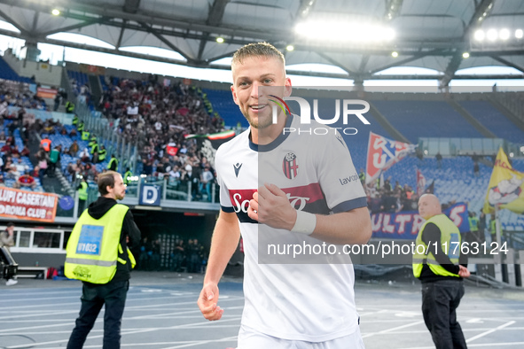 Jesper Karlsson of Bologna FC celebrates after scoring third goal during the Serie A Enilive match between AS Roma and Bologna FC at Stadio...