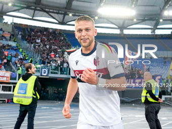 Jesper Karlsson of Bologna FC celebrates after scoring third goal during the Serie A Enilive match between AS Roma and Bologna FC at Stadio...