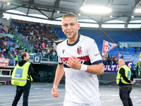 Jesper Karlsson of Bologna FC celebrates after scoring third goal during the Serie A Enilive match between AS Roma and Bologna FC at Stadio...