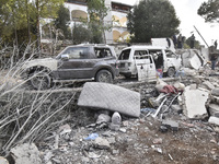 Rescuers search for survivors at the site of an Israeli airstrike that targets the village of Almat north of Beirut, Lebanon, on November 10...