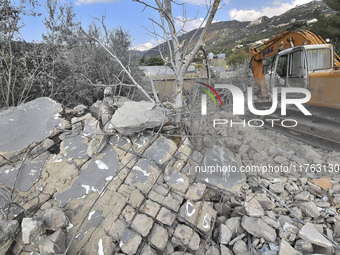 Rescuers search for survivors at the site of an Israeli airstrike that targets the village of Almat north of Beirut, Lebanon, on November 10...