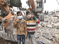 Rescuers search for survivors at the site of an Israeli airstrike that targets the village of Almat north of Beirut, Lebanon, on November 10...