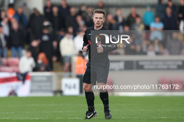 Match referee John Mulligan officiates during the Vanarama National League match between York City and Hartlepool United at LNER Community S...