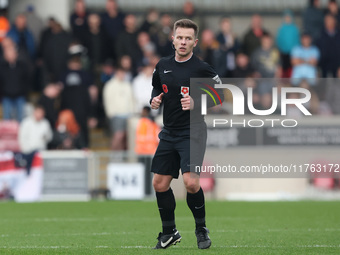 Match referee John Mulligan officiates during the Vanarama National League match between York City and Hartlepool United at LNER Community S...