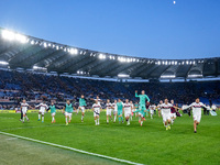 Players of Bologna FC celebrate the victory at the end of the Serie A Enilive match between AS Roma and Bologna FC at Stadio Olimpico on Nov...