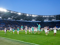 Players of Bologna FC celebrate the victory at the end of the Serie A Enilive match between AS Roma and Bologna FC at Stadio Olimpico on Nov...