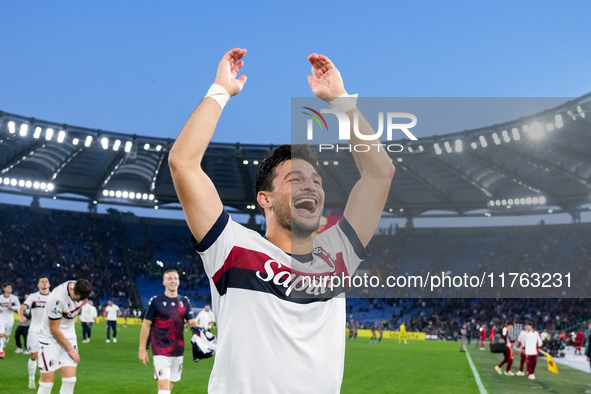 Riccardo Orsolini of Bologna FC celebrates the victory at the end of the Serie A Enilive match between AS Roma and Bologna FC at Stadio Olim...