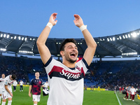 Riccardo Orsolini of Bologna FC celebrates the victory at the end of the Serie A Enilive match between AS Roma and Bologna FC at Stadio Olim...