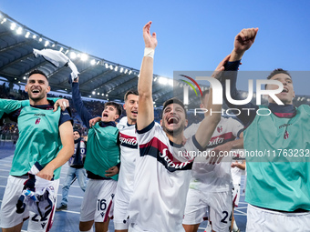 Riccardo Orsolini of Bologna FC and his team-mates celebrate the victory at the end of the Serie A Enilive match between AS Roma and Bologna...