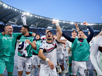 Riccardo Orsolini of Bologna FC and his team-mates celebrate the victory at the end of the Serie A Enilive match between AS Roma and Bologna...