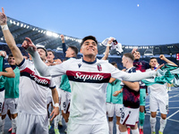 Santiago Castro of Bologna FC and his team-mates celebrate the victory at the end of the Serie A Enilive match between AS Roma and Bologna F...