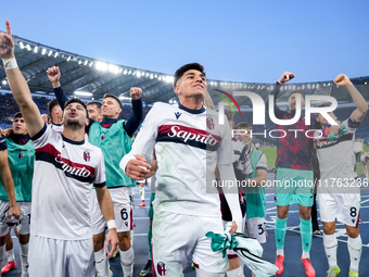 Riccardo Orsolini of Bologna FC and his team-mates celebrate the victory at the end of the Serie A Enilive match between AS Roma and Bologna...