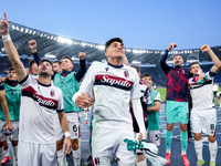 Riccardo Orsolini of Bologna FC and his team-mates celebrate the victory at the end of the Serie A Enilive match between AS Roma and Bologna...