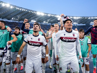 Riccardo Orsolini of Bologna FC and his team-mates celebrate the victory at the end of the Serie A Enilive match between AS Roma and Bologna...