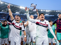 Riccardo Orsolini of Bologna FC and his team-mates celebrate the victory at the end of the Serie A Enilive match between AS Roma and Bologna...