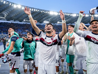 Riccardo Orsolini of Bologna FC and his team-mates celebrate the victory at the end of the Serie A Enilive match between AS Roma and Bologna...