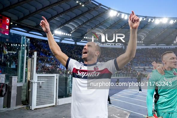 Lorenzo De Silvestri of Bologna FC celebrates the victory at the end of the Serie A Enilive match between AS Roma and Bologna FC at Stadio O...