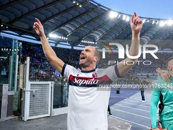 Lorenzo De Silvestri of Bologna FC celebrates the victory at the end of the Serie A Enilive match between AS Roma and Bologna FC at Stadio O...