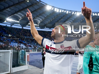 Lorenzo De Silvestri of Bologna FC celebrates the victory at the end of the Serie A Enilive match between AS Roma and Bologna FC at Stadio O...