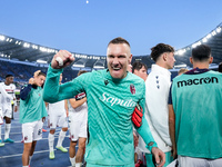 Lukasz Skorupski of Bologna FC celebrates the victory at the end of the Serie A Enilive match between AS Roma and Bologna FC at Stadio Olimp...